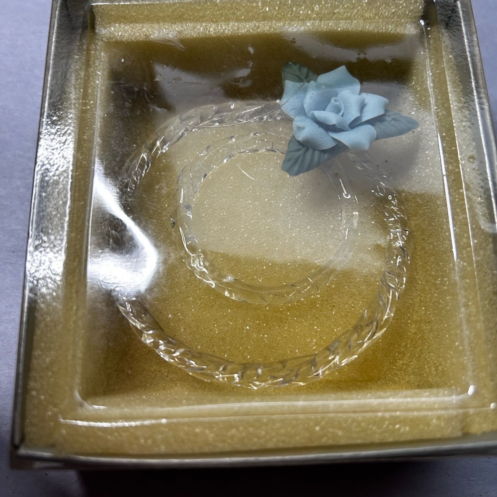 Elegant Clear Glass Clear Hoop Ornament  with a Blue Flower